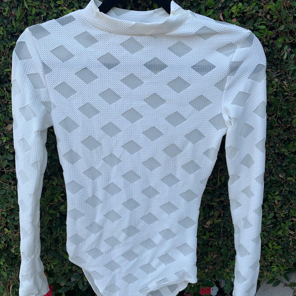 Small white fashion nova body suit
